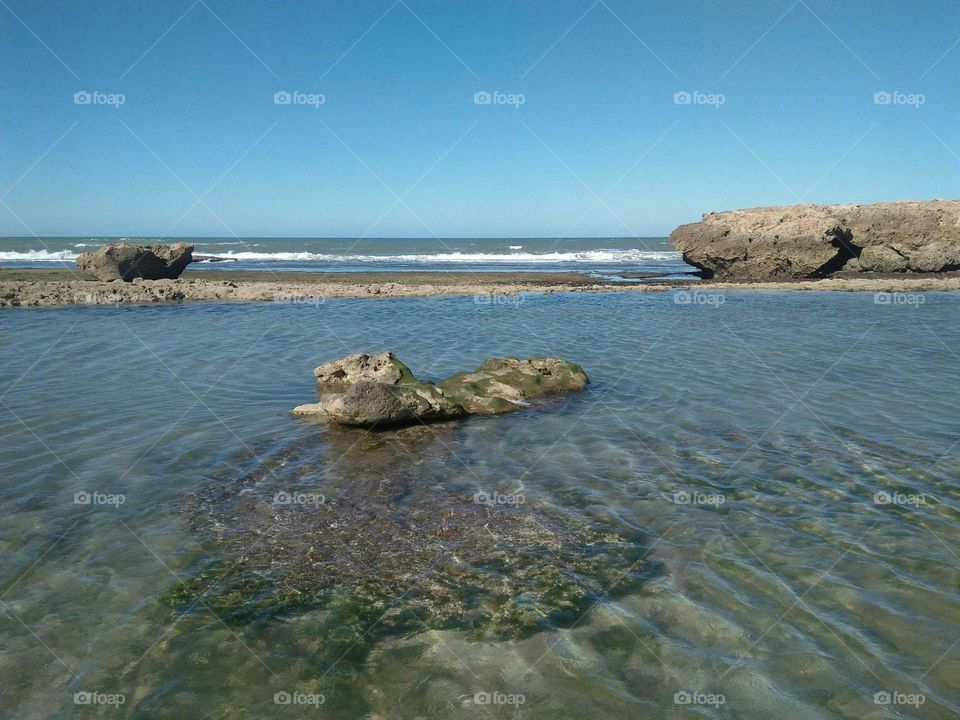 Rocks into the sea