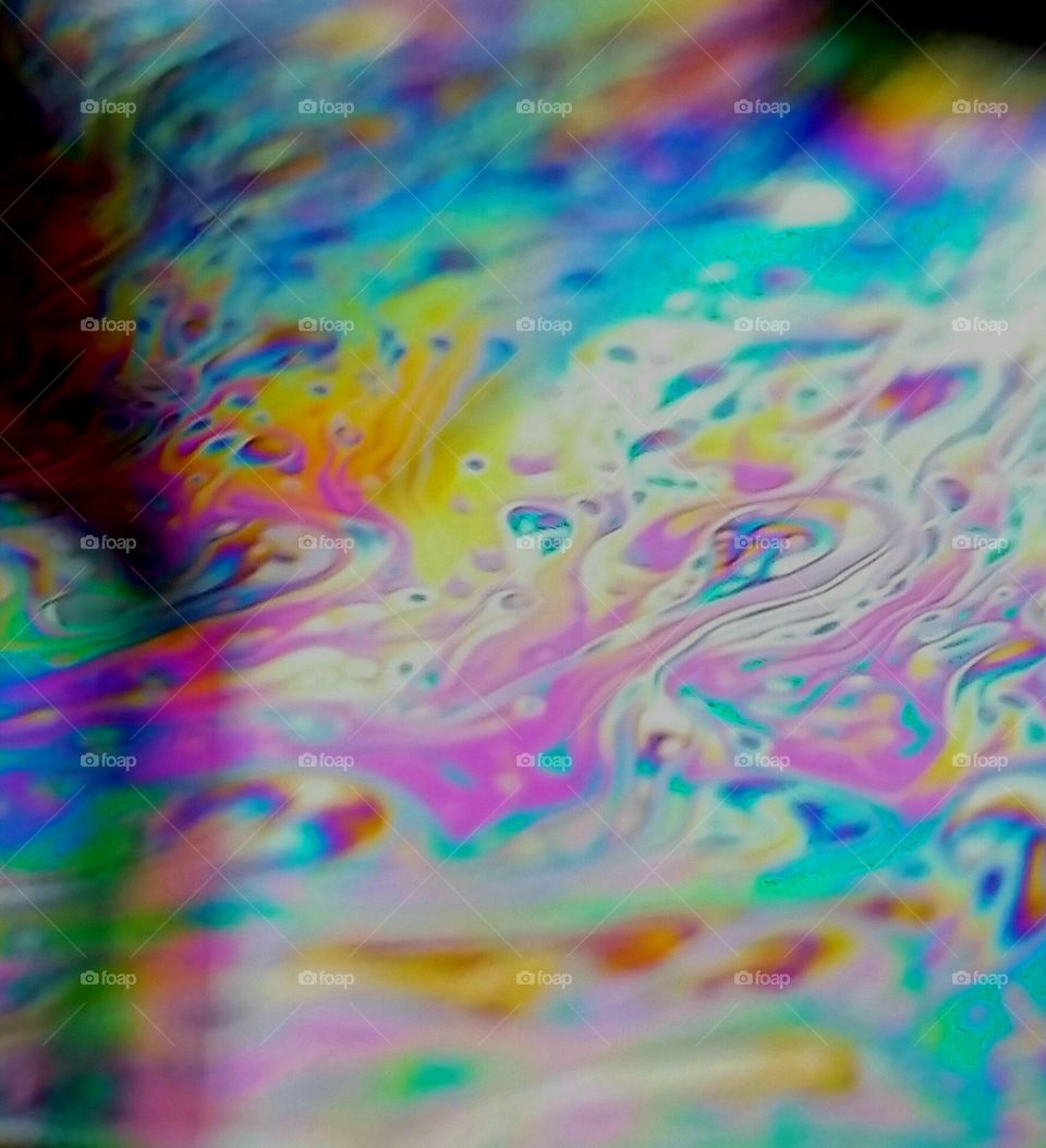 Colore clash in water bubble under sunray.