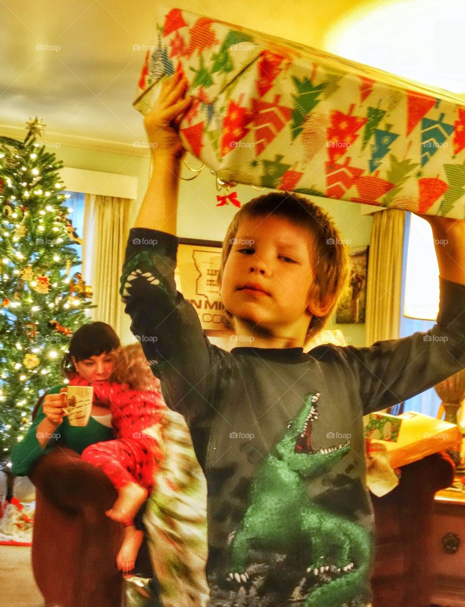 Opening Presents Christmas Morning. Joyful Children Opening Presents
