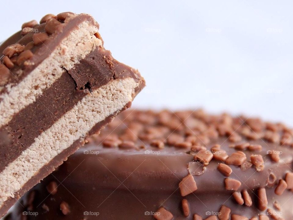 Close-up of a chocolate alfajor