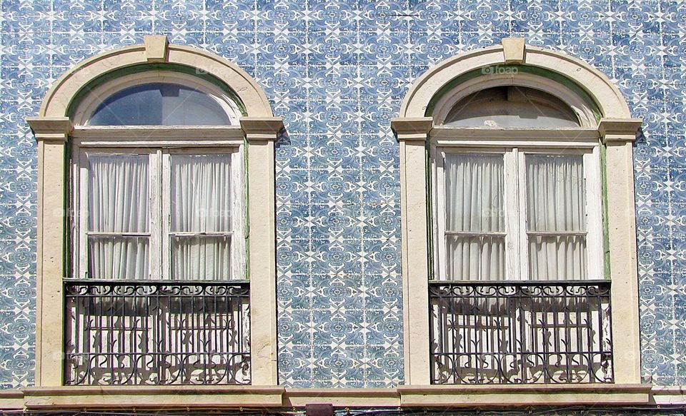 Windows and blue tiles