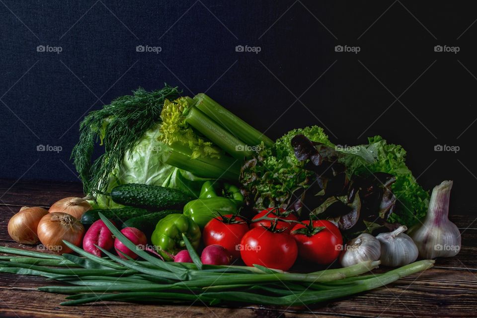 harvest of vegetables on the wooden table
