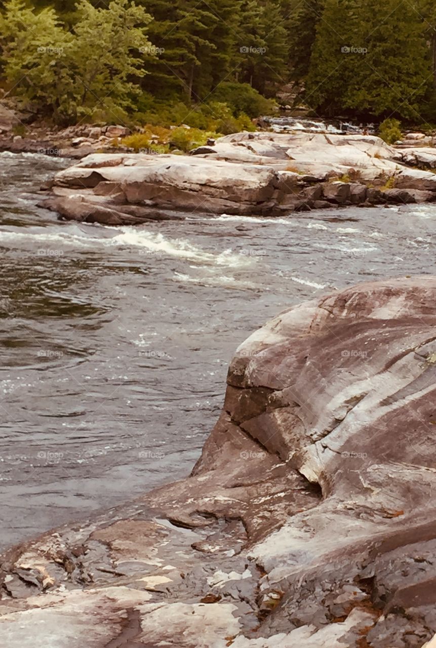 Stunning rapids I can actually body surf here on a warm day people in the dogs come enjoy this all summer long on the French River