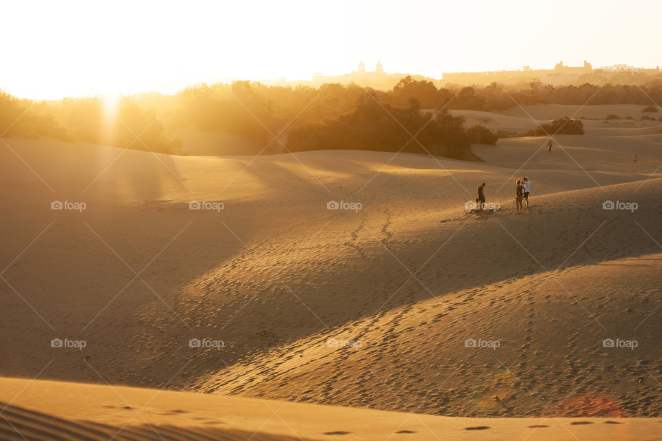 View of the sunset on Gran Canaria on the sand dunes of Maspalomas