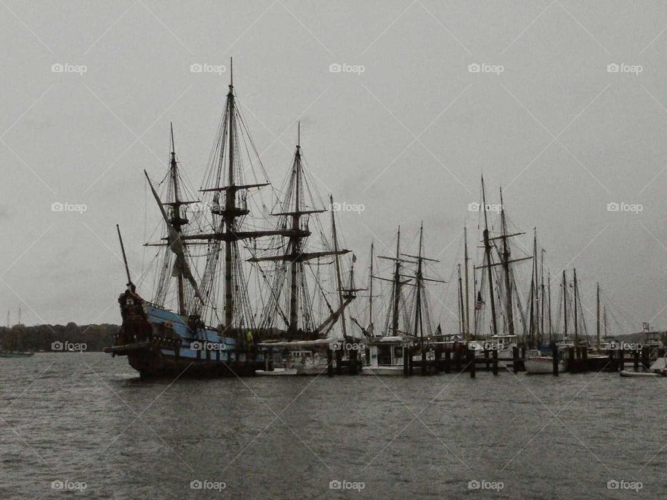 Tall Ships at Dock in Cloudy Weather