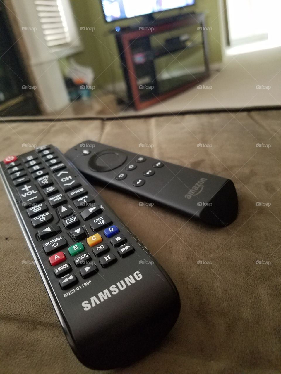 two remote control on the couch