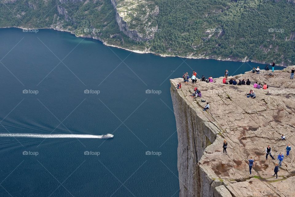 People  at Pulpit Rock . Groups of tourists visiting the Pulpit Rock attraction, Stavanger, Norway.

