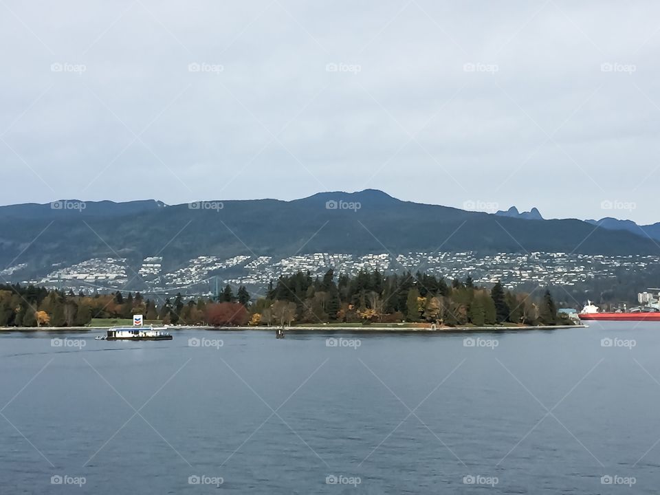 View of Stanley Park and north shore mountains from Canada Place in Vancouver, British Columbia 