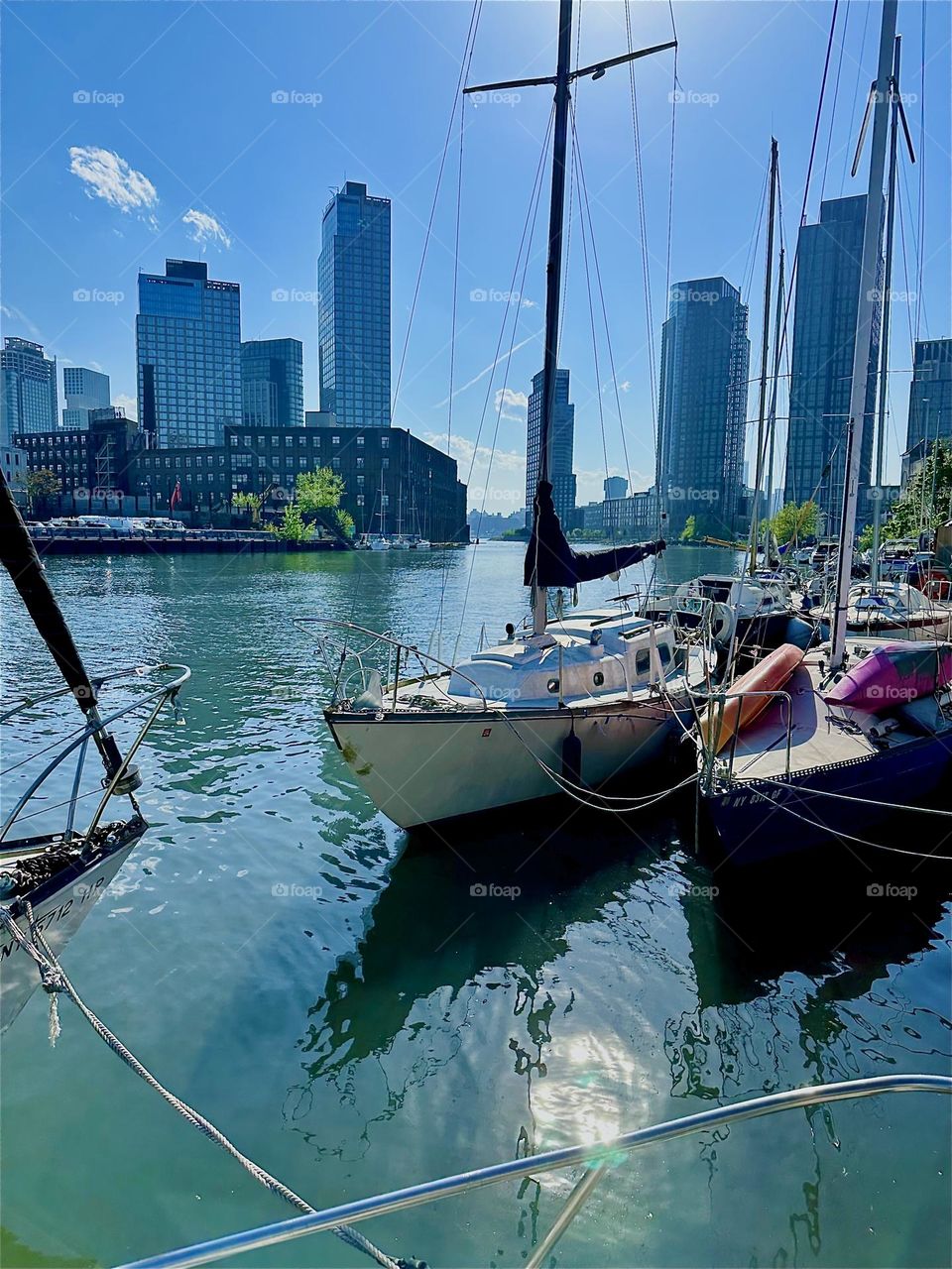 This is “Newtown Creek” by the “Pulaski Bridge” in LIC, Queens with its great variety of boats seen from aboard “Salvation”, the “28 foot 1969 Luhrs” cabin cruiser that is home to myself and partner “Timothy Trespas”. 2024. Hypnotic Productions