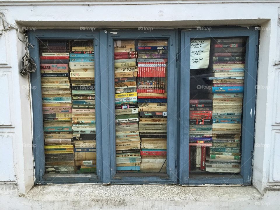 If you want to buy a book just knock at the window