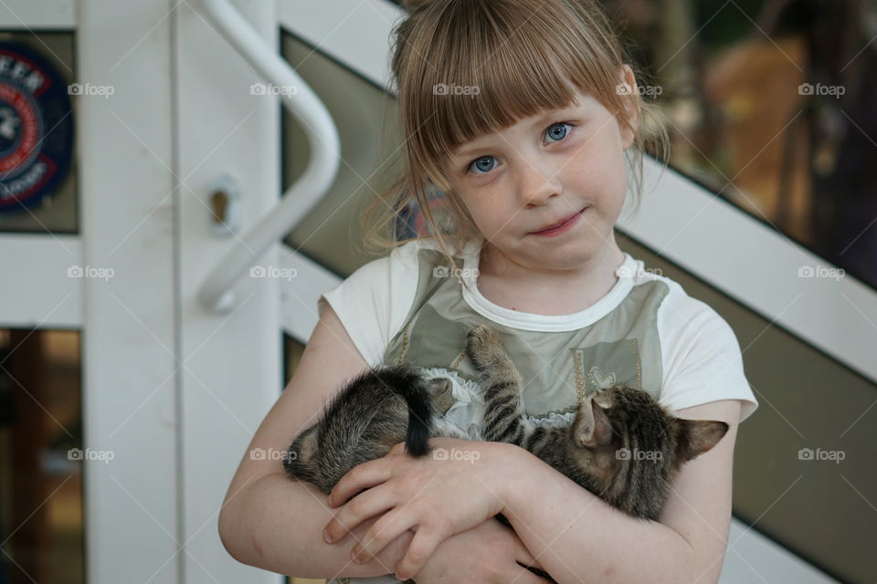 little girl with cat 