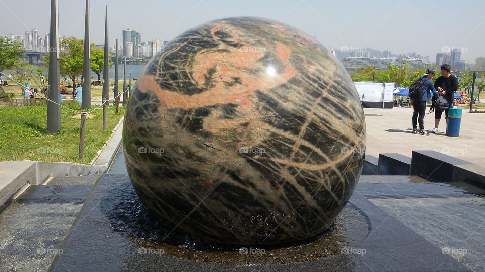 Rolling circle marble. I found this in the park in Korea.