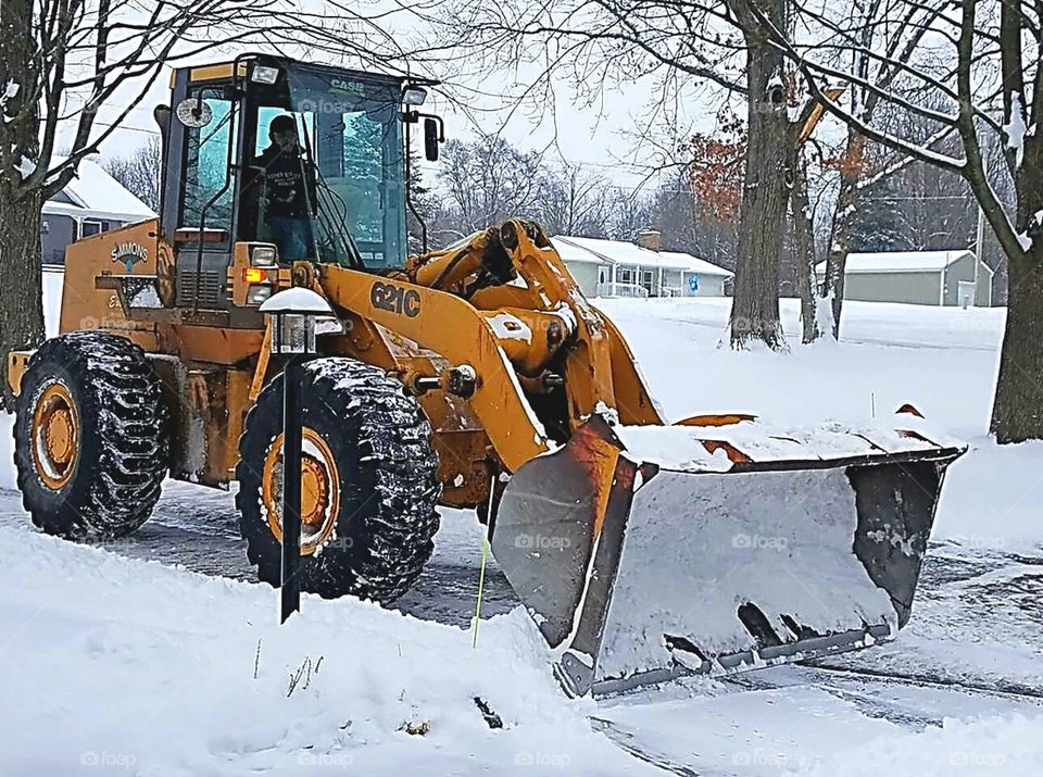 Snow Plowing with a Loader