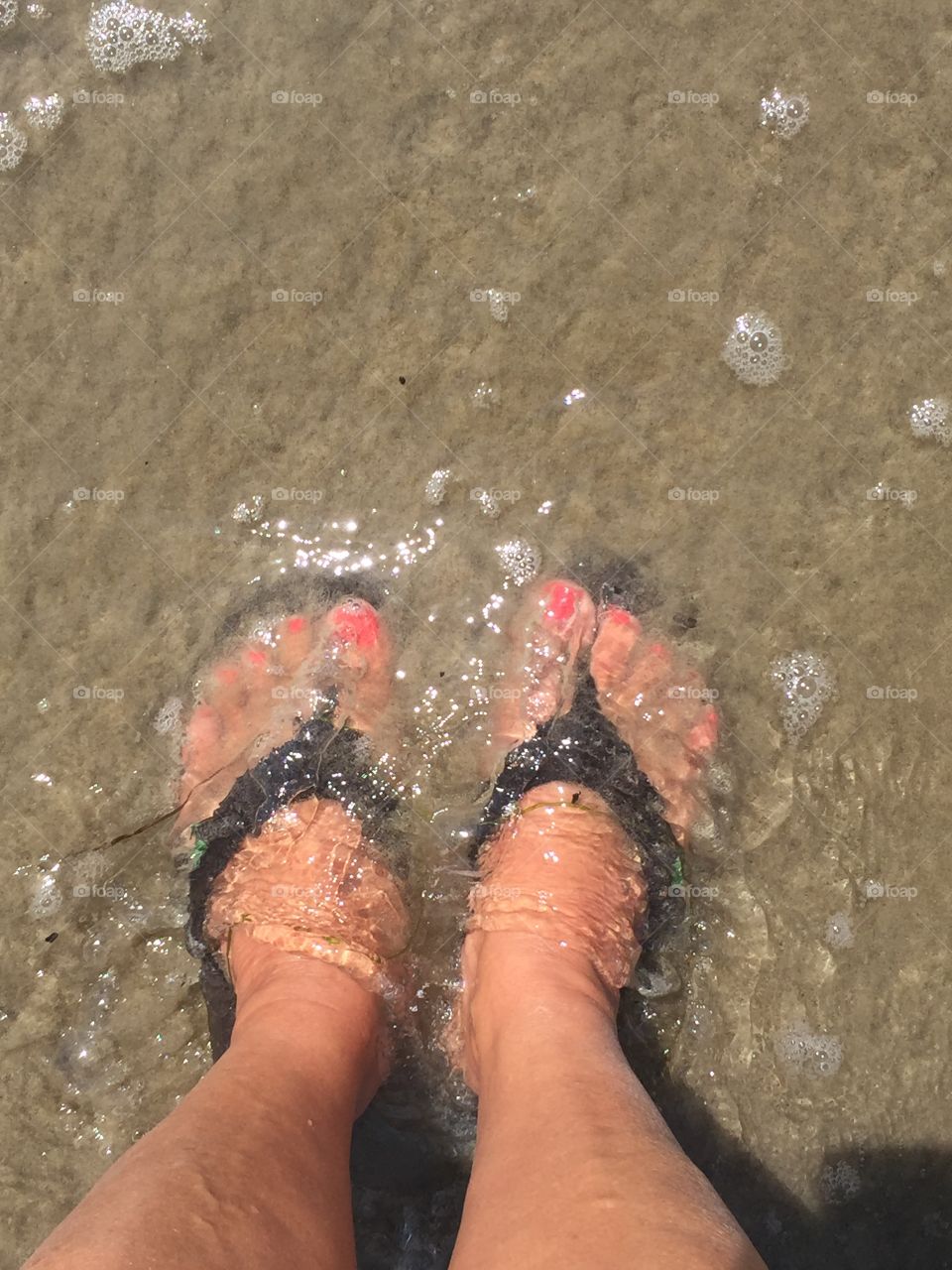 Letting the waves come in and wash over my feet