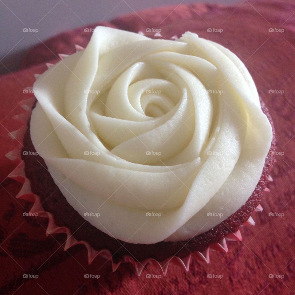Red velvet cupcake with buttercream rose icing 