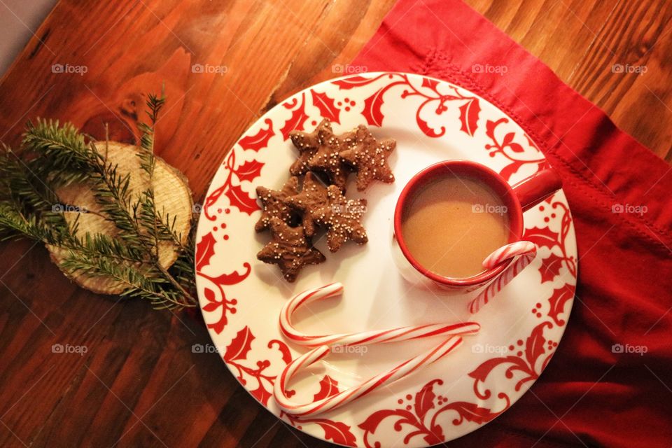 Coffee with cookies and candy cane