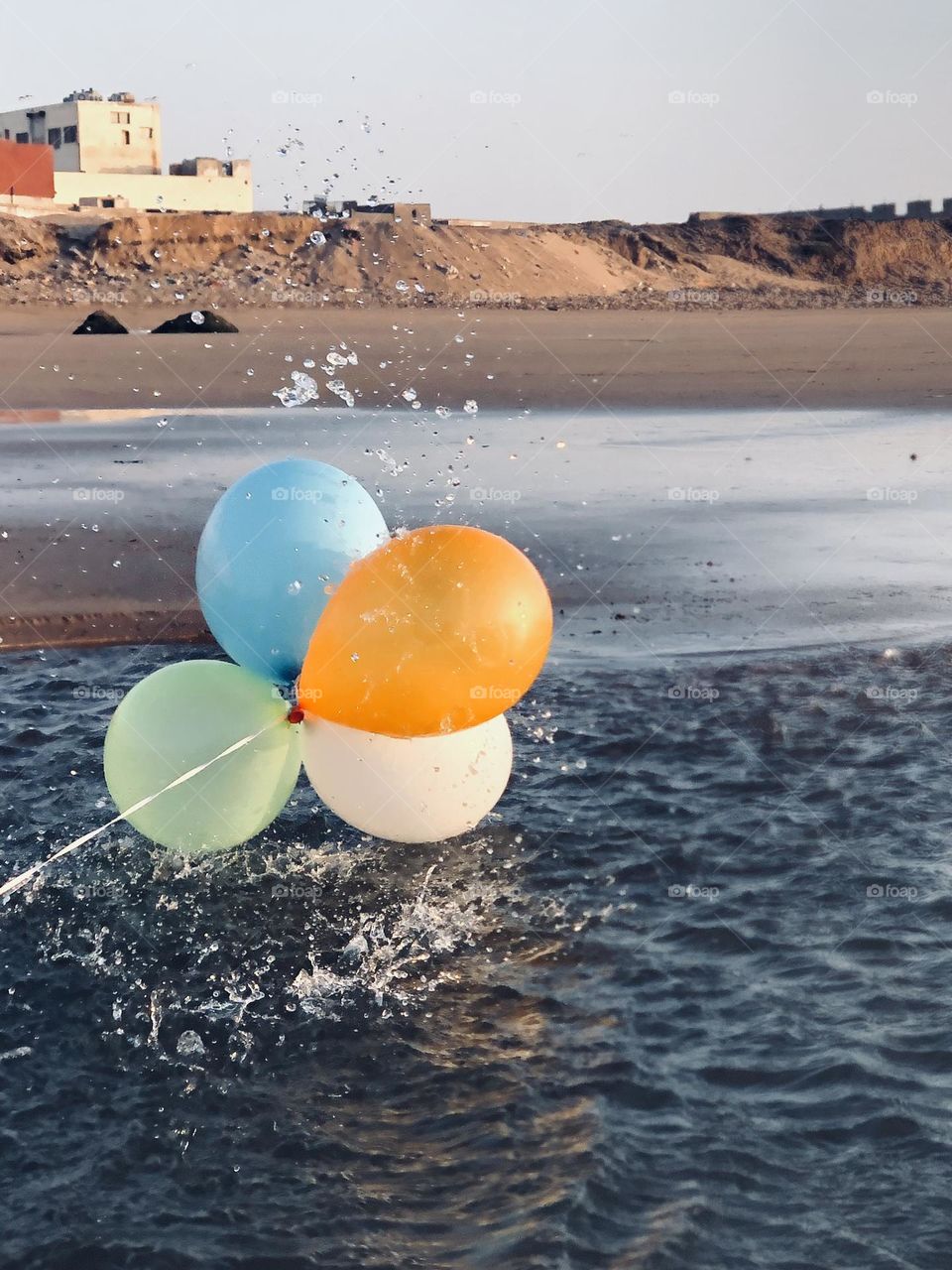 Beautiful balloons into water