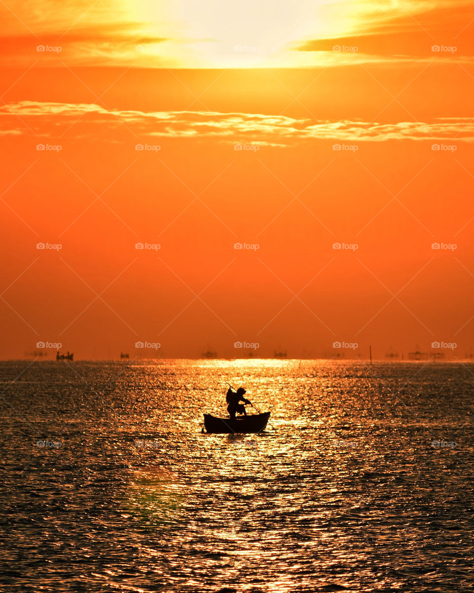 The light of the morning sun on a fishing boat in Bentar Beach, Indonesia