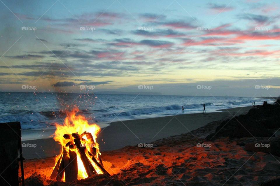Campfire by the sea...hotdogs, s'mores, etc.