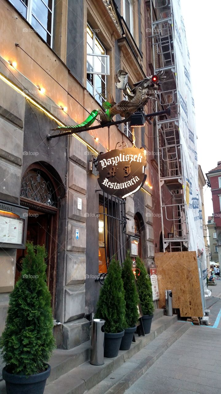 The Bazyliszek Restaurant near Market Square in Old Town Warsaw. legend says a lizard with a white spot lived in the basement and terrified the residents. happily the Badlisk has mellowed over time and is now a tourist attraction, and a place with great food.