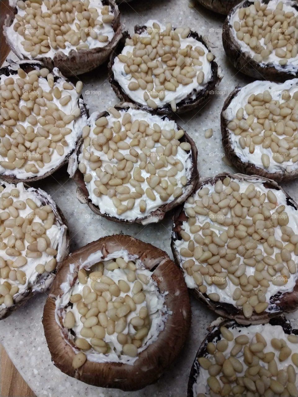 portobello with cheese and pine nuts