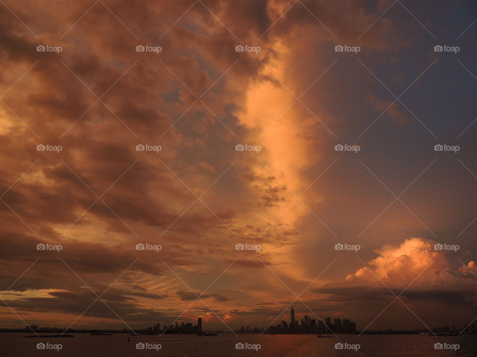 Dusk on the Upper New York Bay. I took this photo during sunset from the Staten Island Ferry in New York City. 