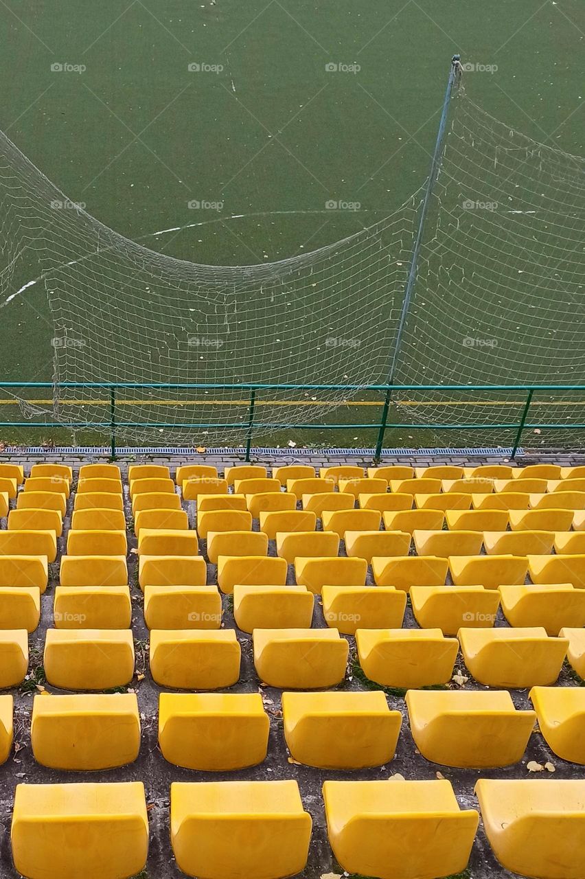 yellow seats in the stadium