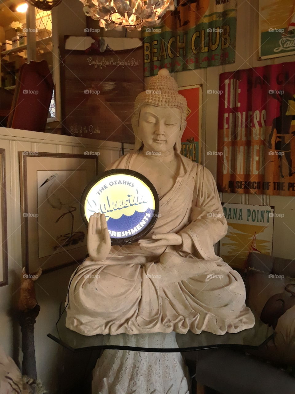 Vivilore restraurant Independence Missouri Buddha with antique sign