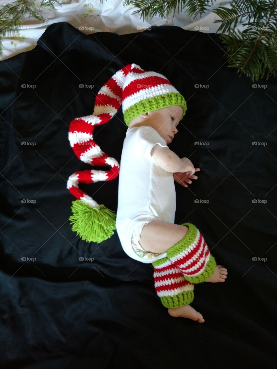 Elevated view of a baby wearing woolen cap