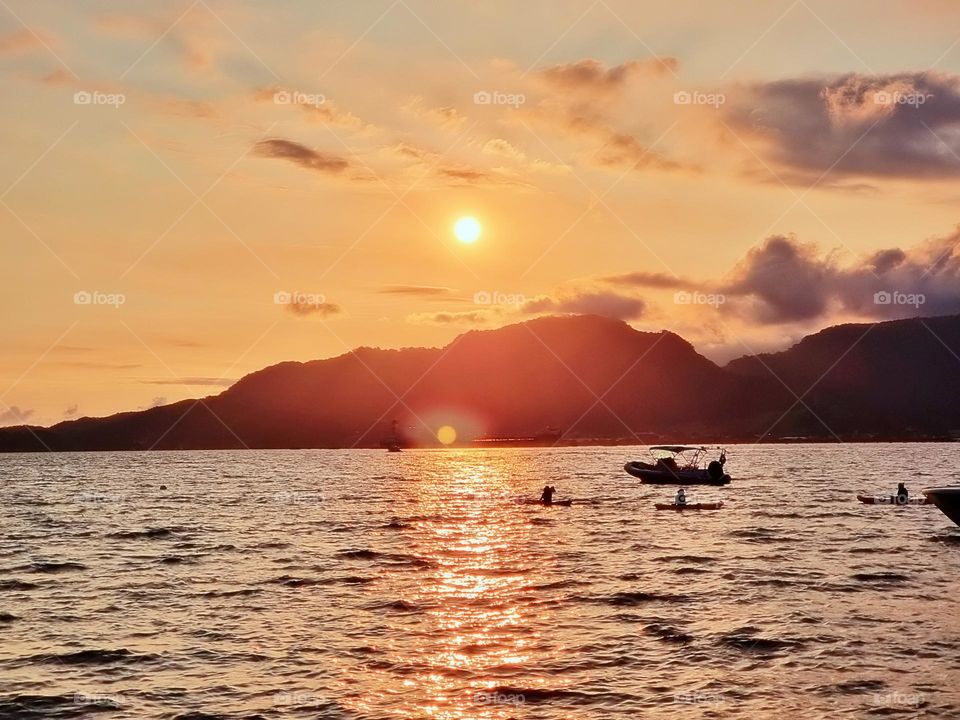 environment sunshine reflection peaceful day island air calm coast abstract tropical vacation golden panoramic tree season tranquil atmosphere tourism scenery seascape cloudy paradise natural panorama weather heaven clouds cloudscape bright scene col