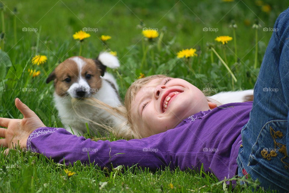 Smiling girl with dog