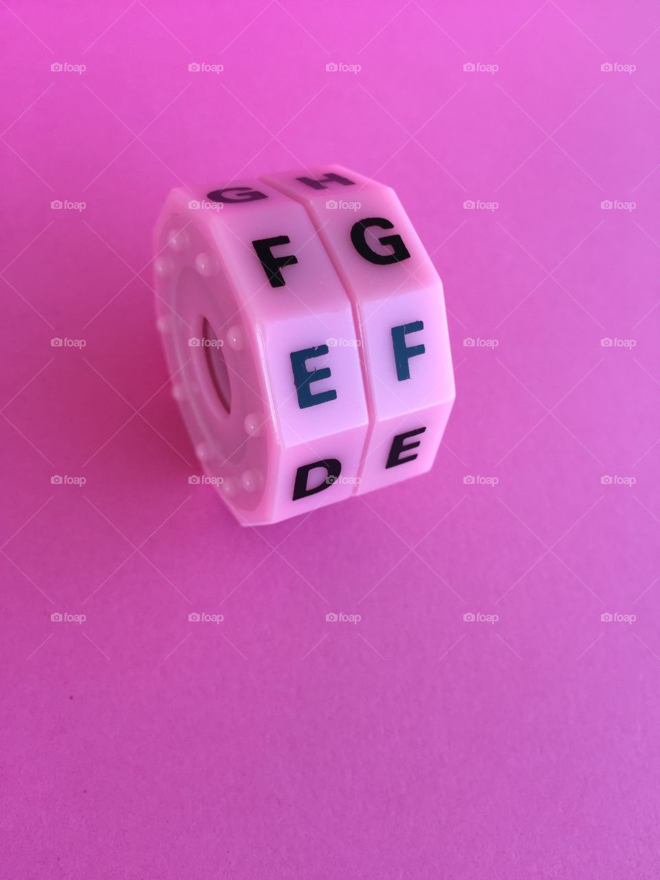 Puzzle against pink background