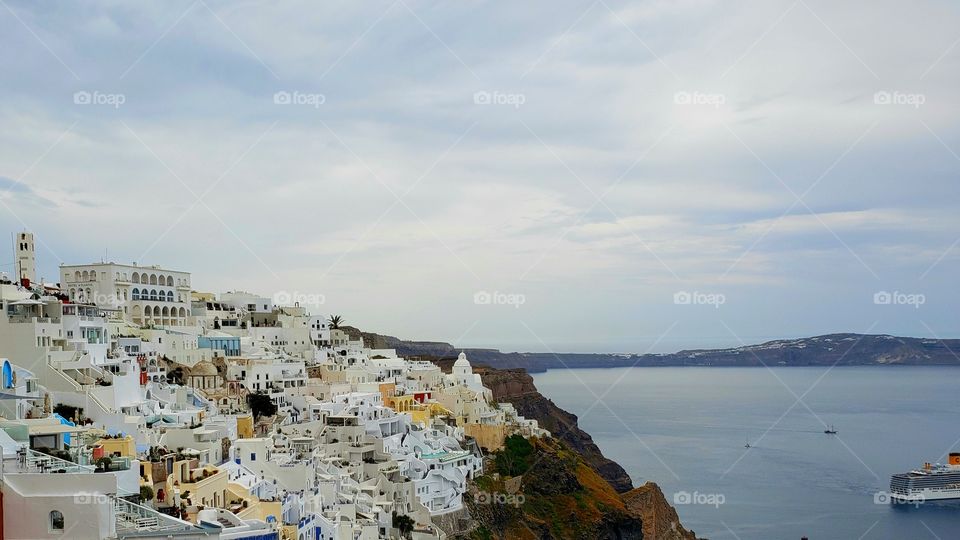 View from above, high up on the island of Santorini, Greece, Europe. Looking out towards village and ocean.