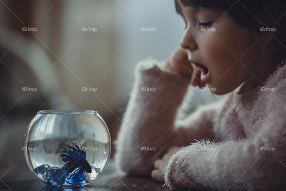 Little fish and girl