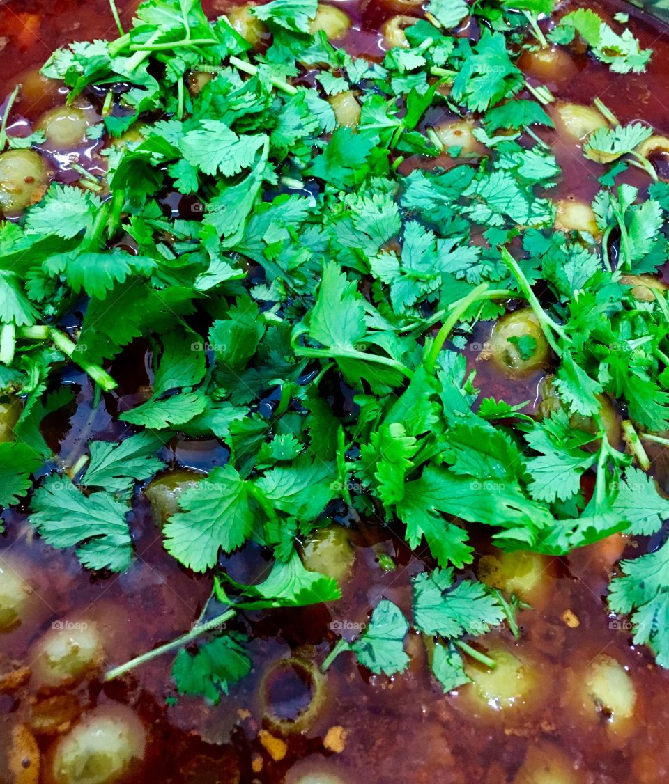 Meat patties with olives and coriander