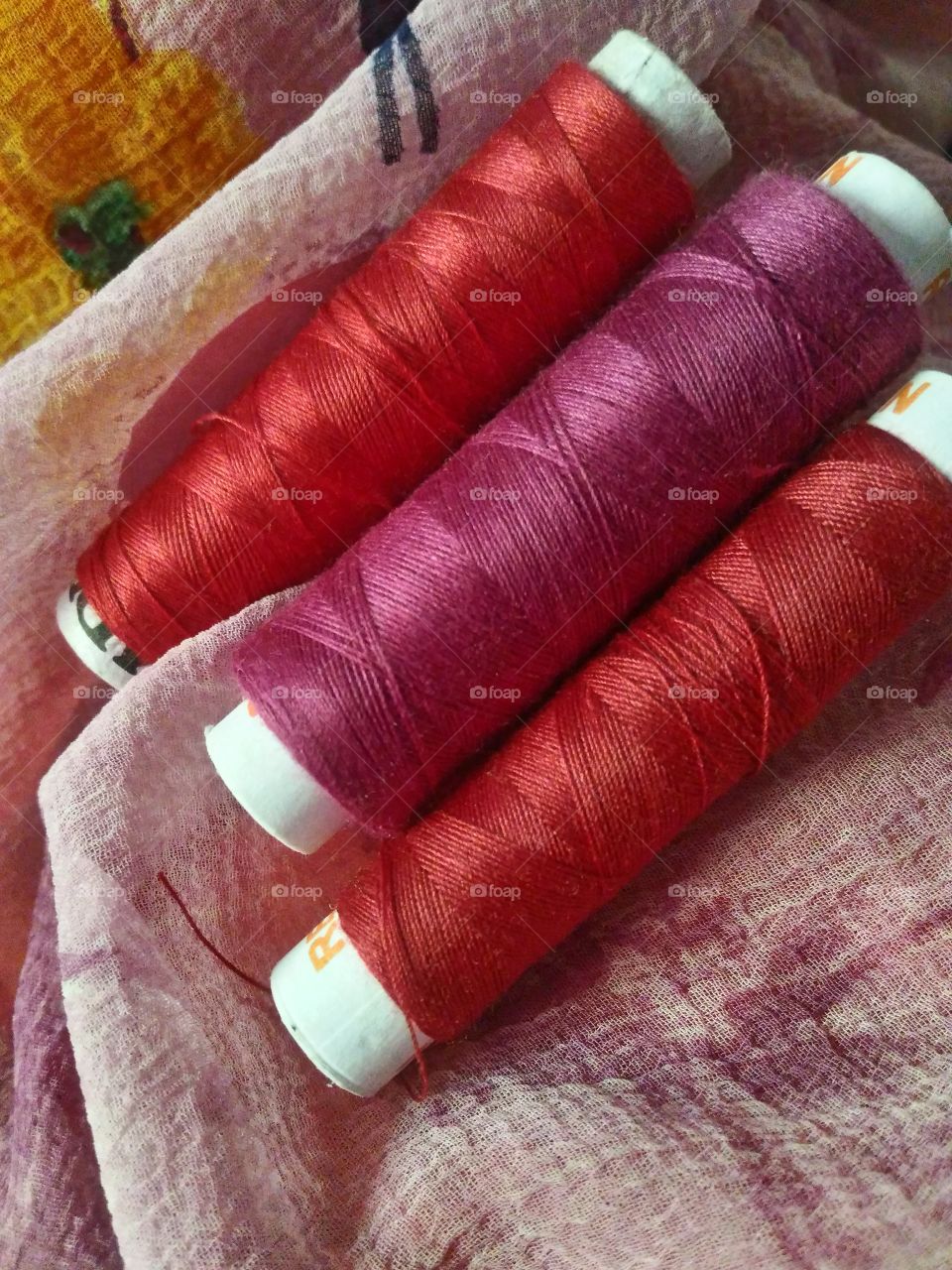 Pink cotton thread reel