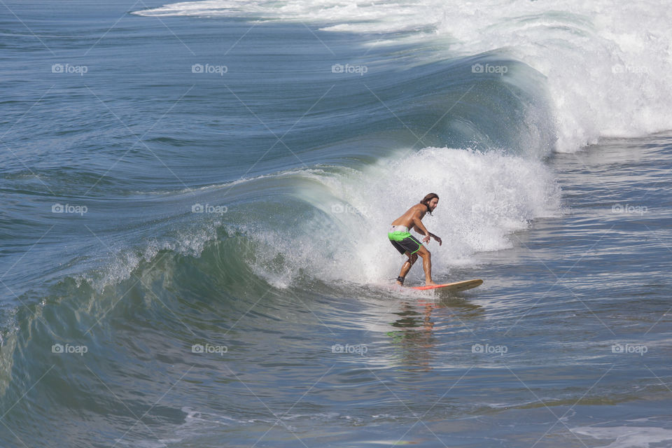 Surfing at Venice Beach,  California