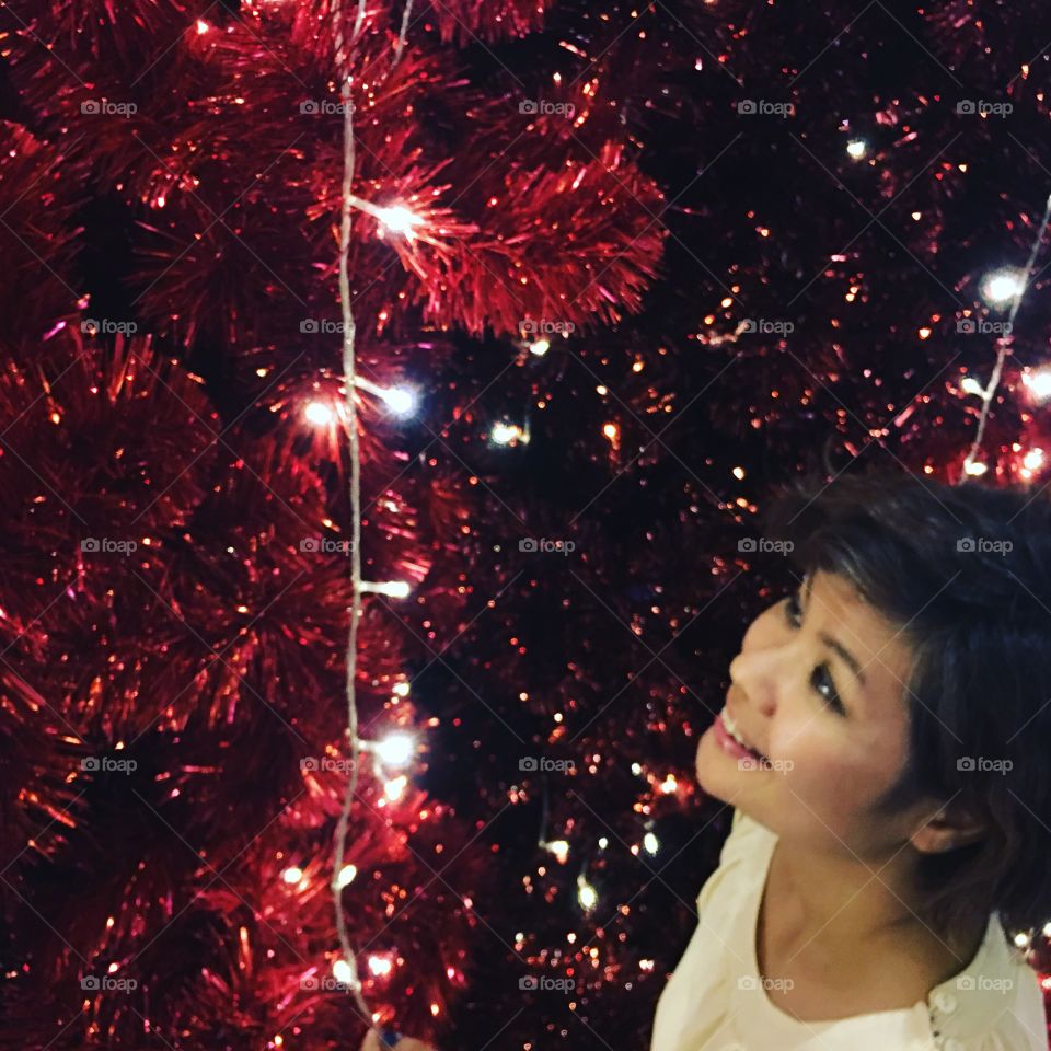 Woman and Christmas tree 