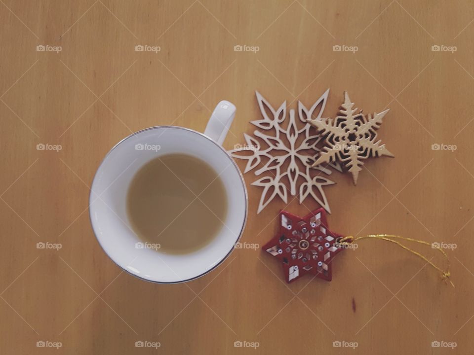 Simple cup of mint tea with a few winter decorations