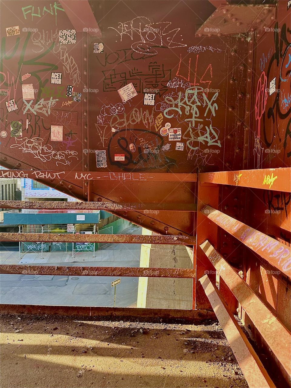 The red metal staircase of the “Pulaski Bridge” at “Newtown Creek” in LIC, Queens is very “Bauhaus” inspired due to its bold prime color, strong and simple geometry, highly functional design and its futuristic look. 2024. Hypnotic Productions