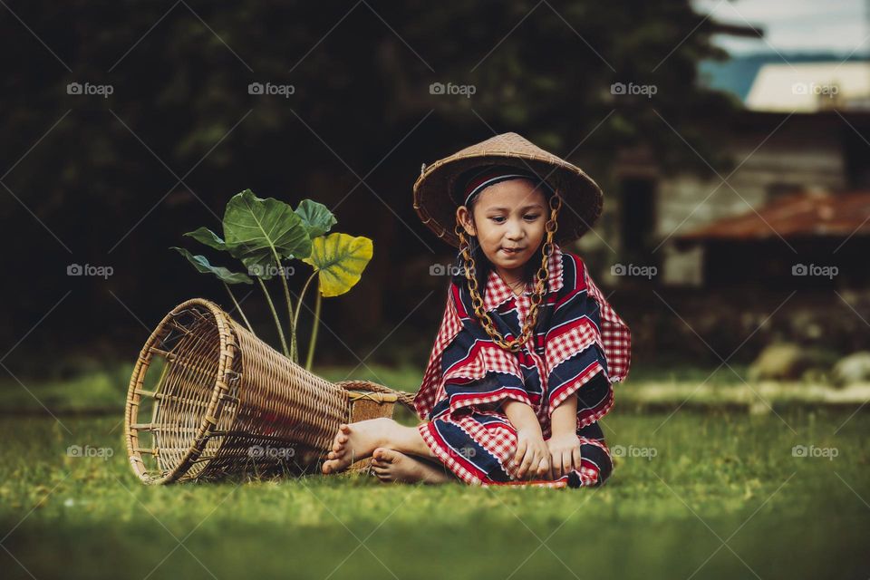 from ground up. portrait of a little girl.