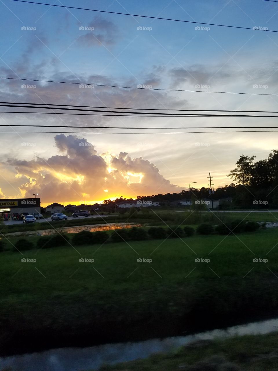 Sunset behind clouds
