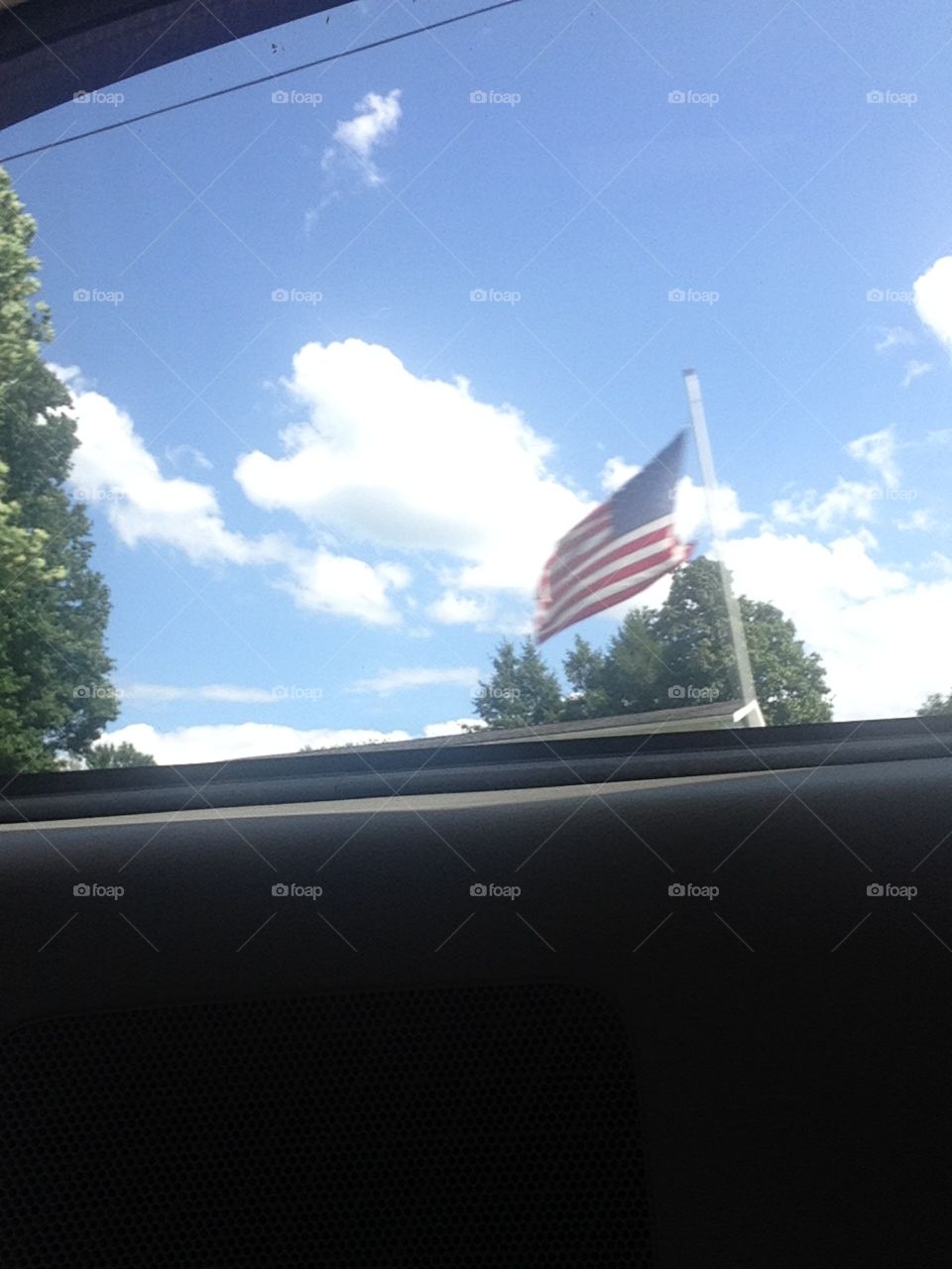 American flag from car window