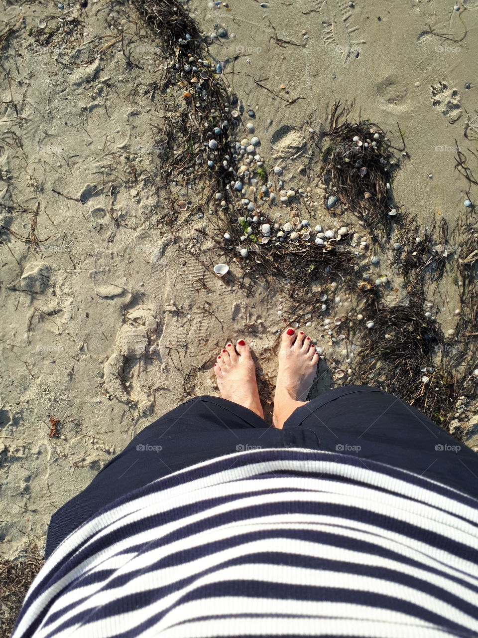 Woman's barefeet at the beach