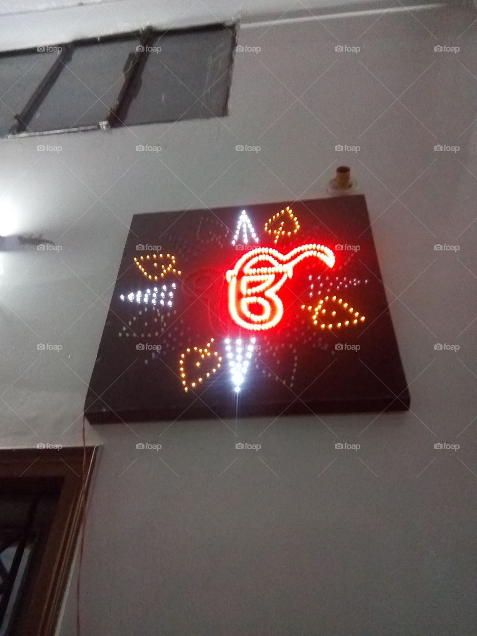 A Sign of Shree Vaheguru Ji (God) in Sikhism made of beautiful blinking lights