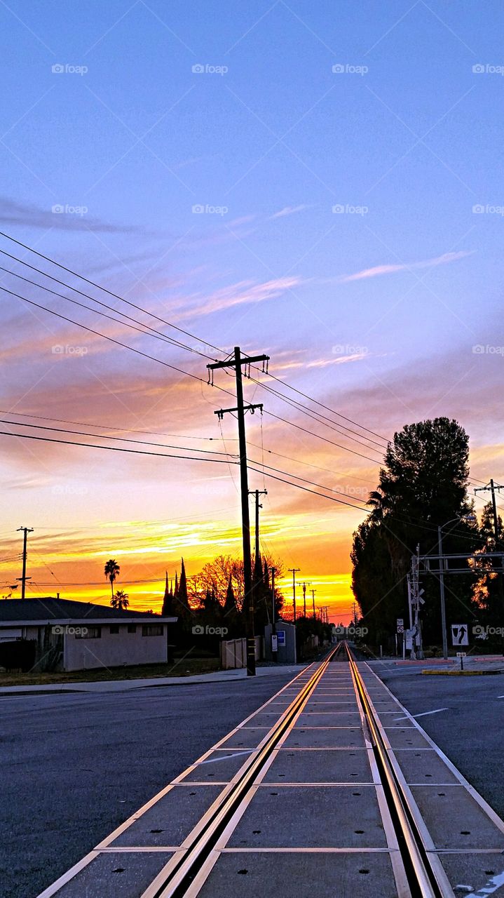 Sunset glow reflected on railroad tracks!