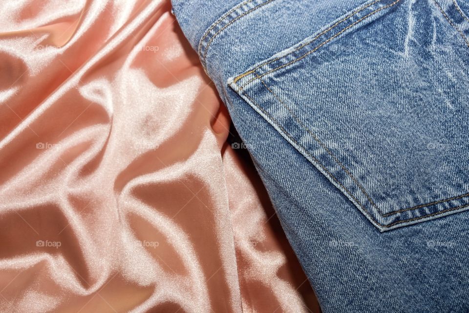 Orange satin dress and jeans. Formal and casual