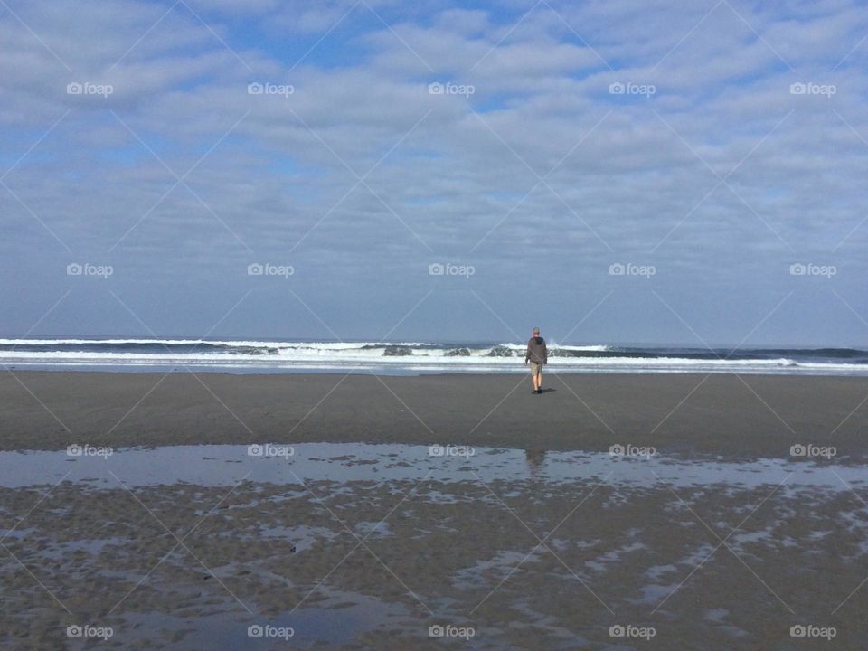 A Lone person by the Beach