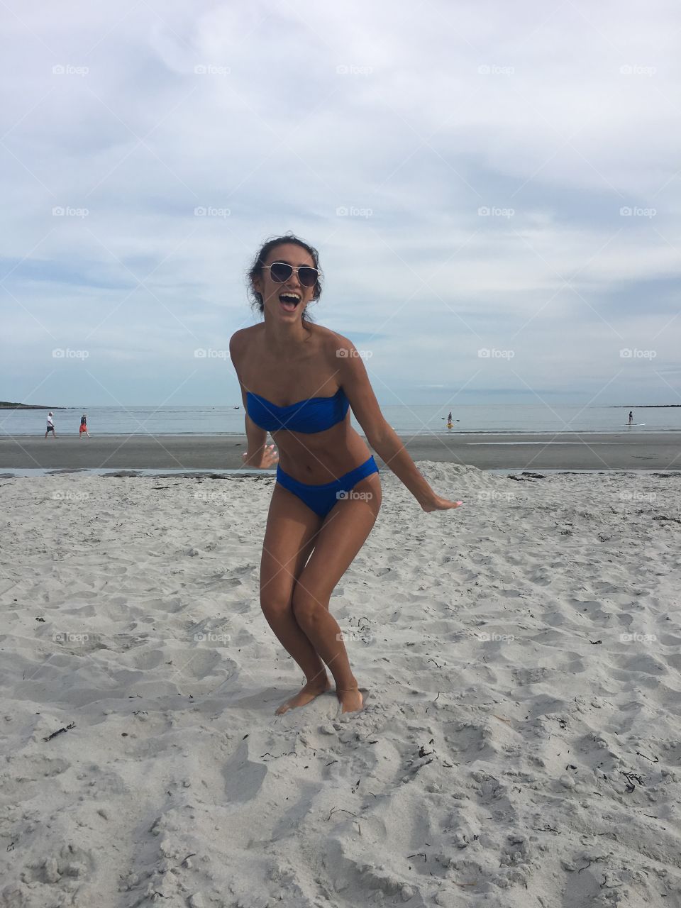 Sexy woman posing on beach