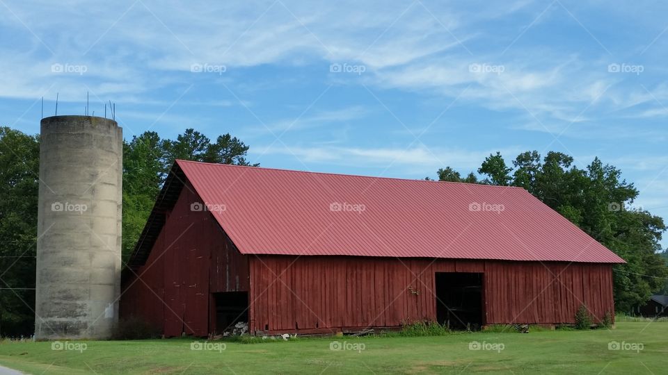 Red barn in field